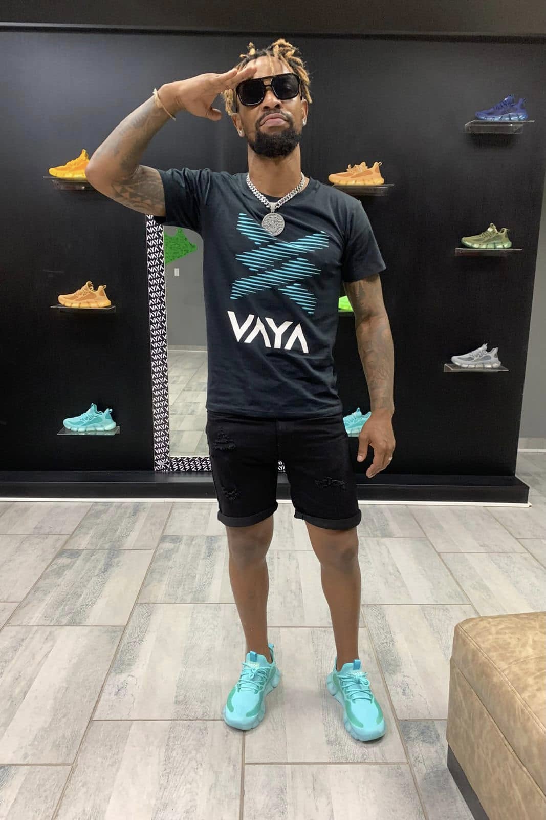 VAYA Sky Blue sneakers and a VAYA T-shirt worn in store